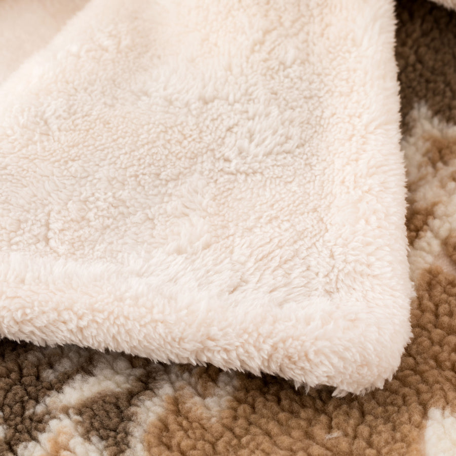 Glades Plaid - Plaid in lana cotta jacquard con applicazione Glades.