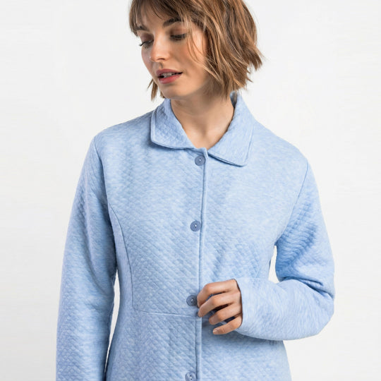 67422-0 - Vestaglia in maglia interlock trapuntata a maniche lunghe di colore blu