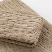 Sorku set 1+1 - Set in spugna jacquard 500gr con disegno a rilievo tinta su tinta