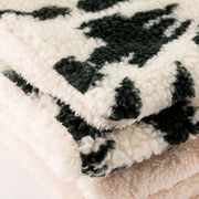 Glades Plaid - Plaid in lana cotta jacquard con applicazione Glades.