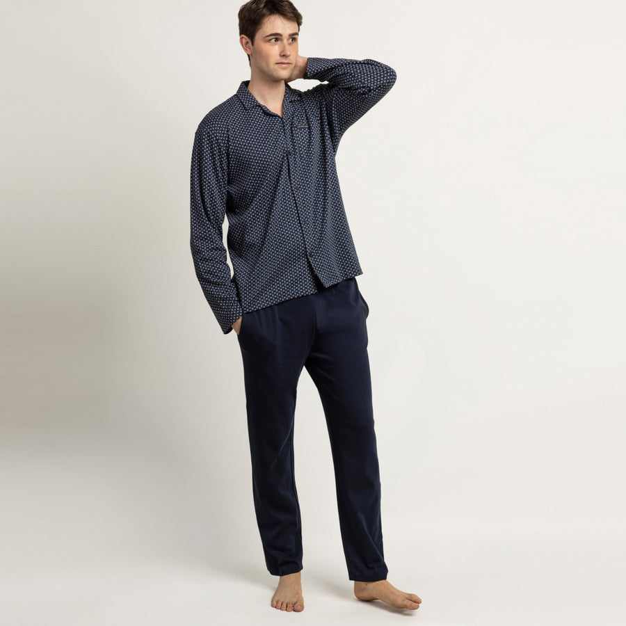 64182-0 - Pigiama a maniche lunghe in maglia interlock di cotone con colletto a revers e pantaloni lunghi.