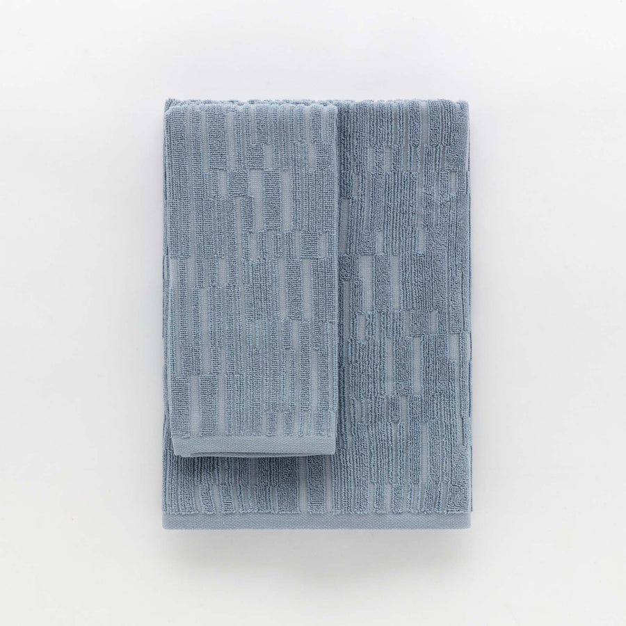 Sorku set 1+1 - Set in spugna jacquard 500gr con disegno a rilievo tinta su tinta