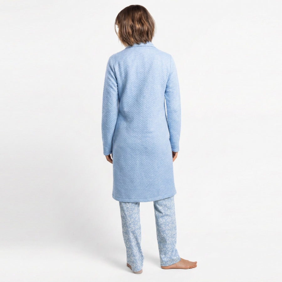 67422-0 - Vestaglia in maglia interlock trapuntata a maniche lunghe di colore blu