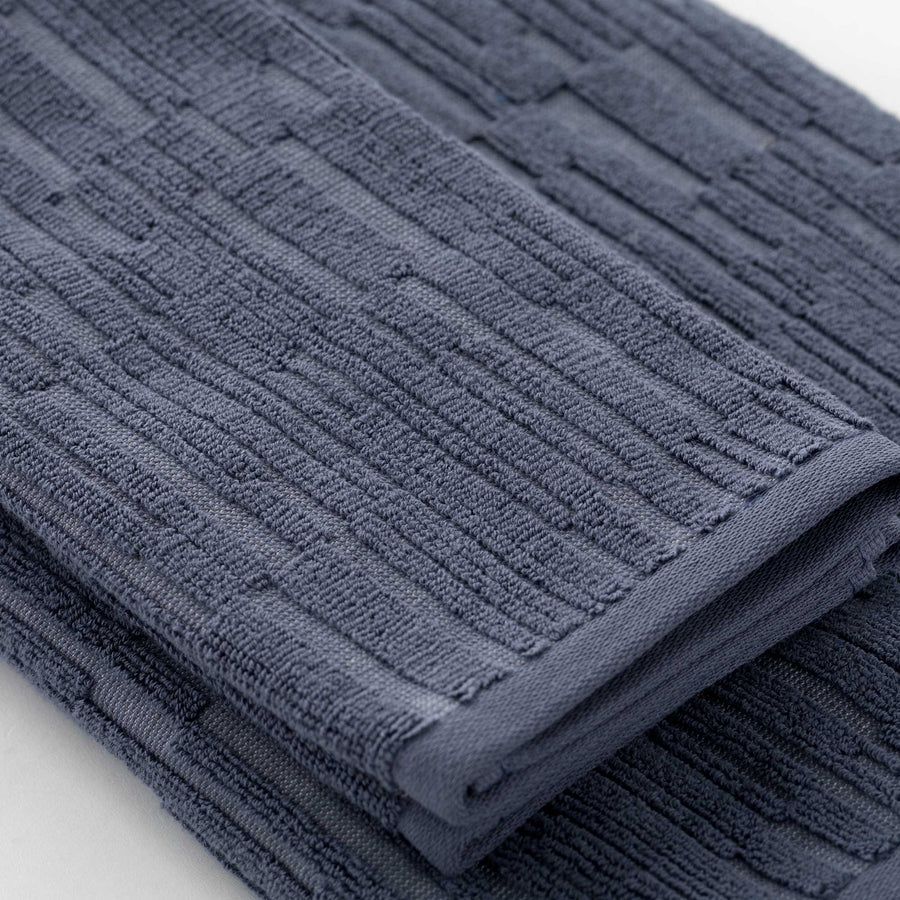 Sorku set 1+1 - Set in spugna jacquard 500gr con disegno a rilievo tinta su tinta