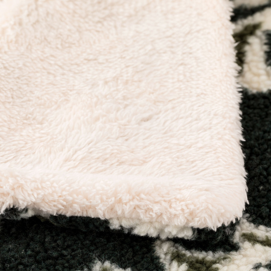 Glades Plaid - Plaid in lana cotta jacquard con applicazione Glades.