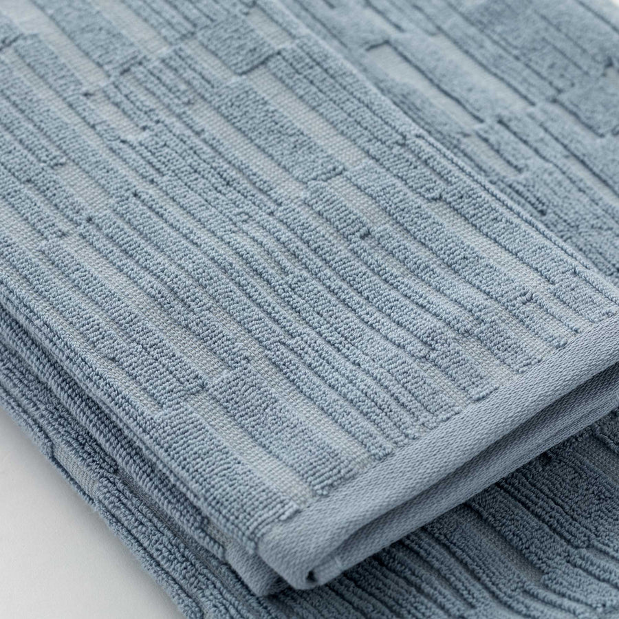 Sorku set 1+1 - Set in spugna jacquard 500gr con disegno a rilievo tinta su tinta