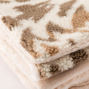 Glades Plaid - Plaid in lana cotta jacquard con applicazione Glades.