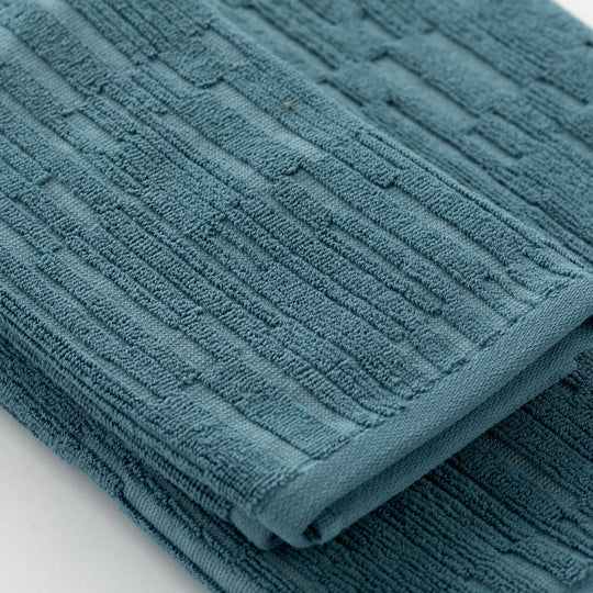 Sorku set 1+1 - Set in spugna jacquard 500gr con disegno a rilievo tinta su tinta